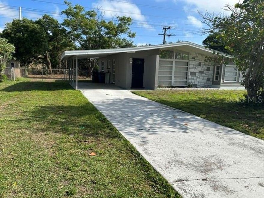 2 bedroom 1 bathroom home in Kensington Park.  New roof in 2020 and new a/c in 2023.  Large yard with chain link fence.  Solid wood cabinets in kitchen.  Vaulted ceiling in kitchen & great room.  What an opportunity!