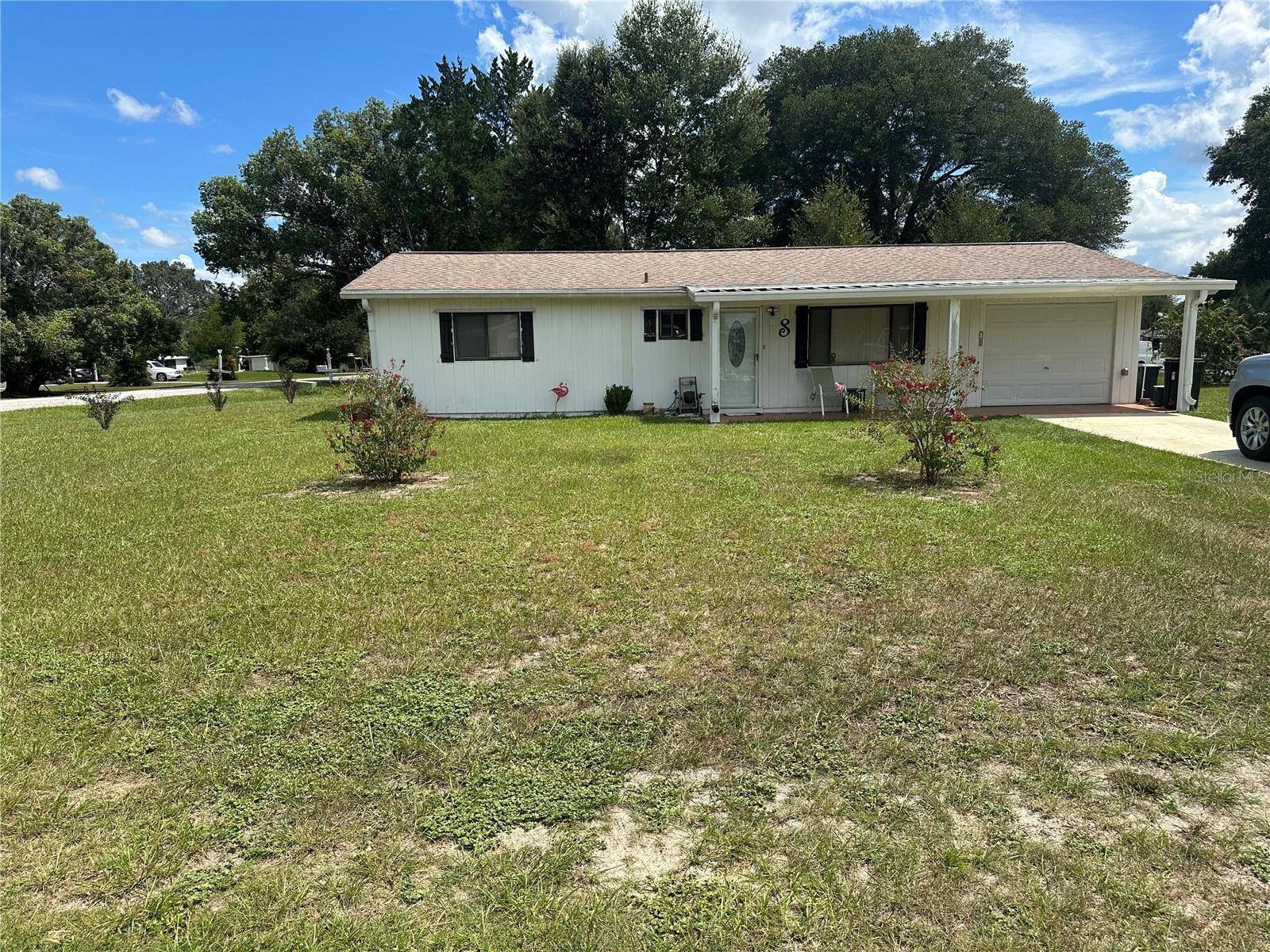 This charming 1040 sq ft home in Pine Run boasts an updated kitchen that's sure to impress! The bathrooms have been renovated, the A/C was replaced in 2023, and the roof was redone in 2016. The property includes a small garage and a spacious yard with a fenced area for pets and plenty of space for gardening. Pine Run offers activities for everyone, such as billiards, pickleball, a gym, card games, bingo, dancing, and singing events. Schedule a visit to tour the home and meet the welcoming community of neighbors!