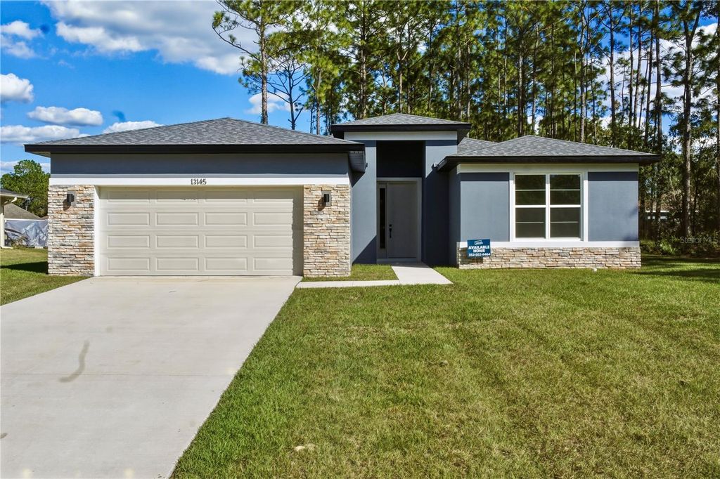 Photo of 13145 SW 78th Circle, Ocala, FL 34473 (MLS # OM715635)