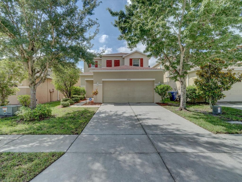 Photo of 17552 Queensland Street, Land O Lakes, FL 34638 (MLS # TB8458926)