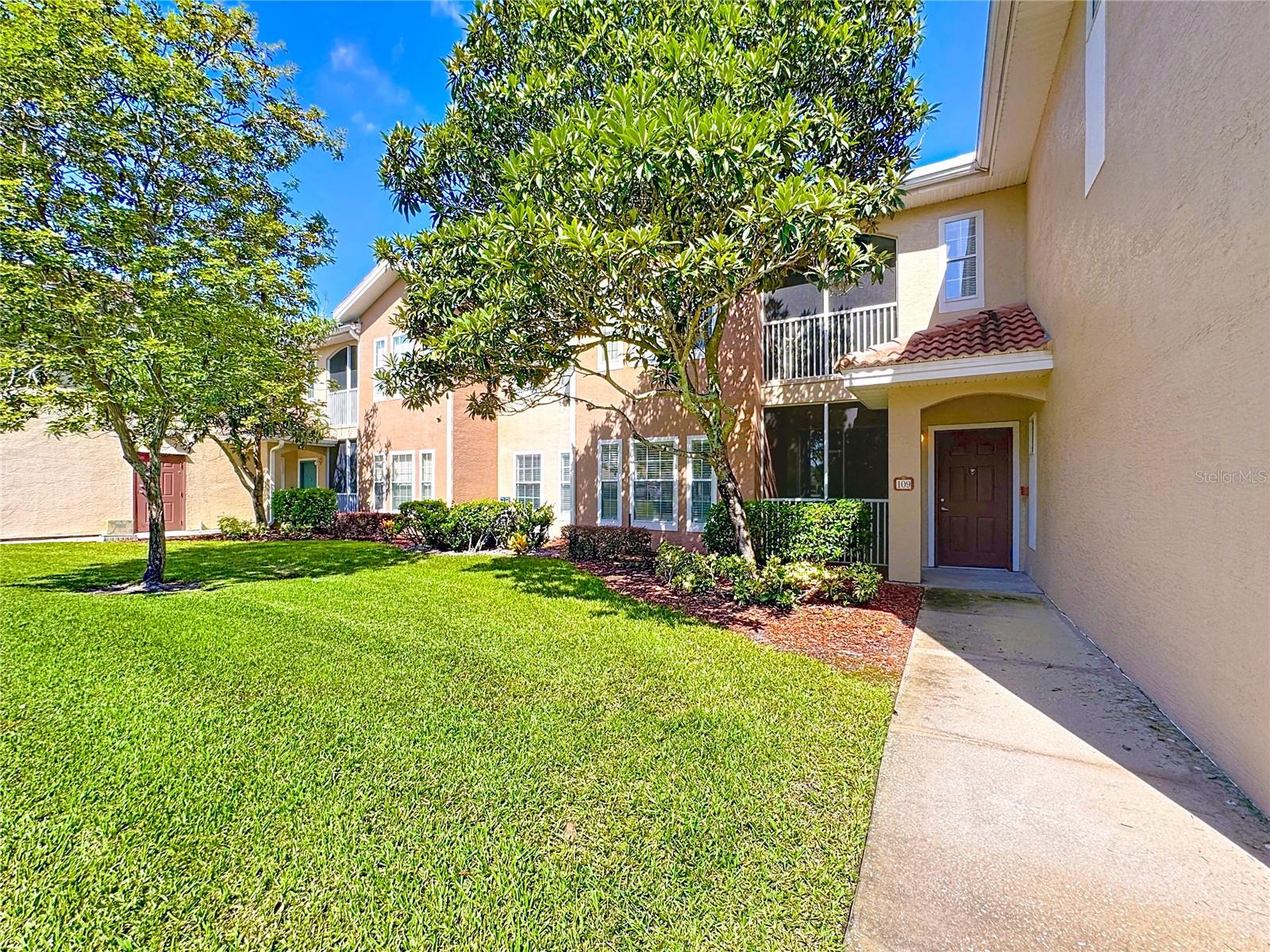 Welcome home to this GROUND LEVEL beautifully maintained 3 bedroom, 2 bathroom condo in the gated community of Villanova at Hunters Creek! Enjoy a morning coffee or tea on the private screened patio with serene views of the community’s landscaped grounds and pond, often visited by ducks gliding peacefully across the water.
Step inside to find an open layout featuring a spacious living and dining area, new LVP flooring in living, dining and bedrooms and tile in kitchen and bathroom. NEW kitchen appliances and a nice size kitchen with pantry closet as well as indoor laundry room add to the ease of everyday living. The split-bedroom floor plan provides privacy and comfort, with a generous 16 x12 primary suite complete with a walk-in closet and ensuite bathroom. The second bedroom (12x12) has 3 windows flooding the room with natural light and a third bedroom (10 x 10) share a second generously sized bathroom. The built-in desk in the hallway makes the perfect small office space. This condo also has A larger than average ONE CAR GARAGE.
Villanova offers resort-style amenities including a large community pool, fitness center, and clubhouse which is available for owners to reserve for birthday parties, baby showers and more. Beyond the gates, the vibrant Hunters Creek community continues to impress. Residents enjoy multiple parks, playgrounds, tennis and basketball courts, and miles of walking trails. Just steps away you’ll find local favorites such as KeKe’s Breakfast Café, The Naked Cupcake, Miller’s Ale House, and Sakura Asian Bistro. Publix, medical offices and The Loop Shopping Center is a short drive.
With highly sought-after schools, easy access to SR 417, Orlando International Airport just 15 minutes away, and world-famous attractions within 30 minutes, this home truly checks all the boxes.
All information, including room sizes, is deemed reliable but should be independently verified by the buyer or their agent.
