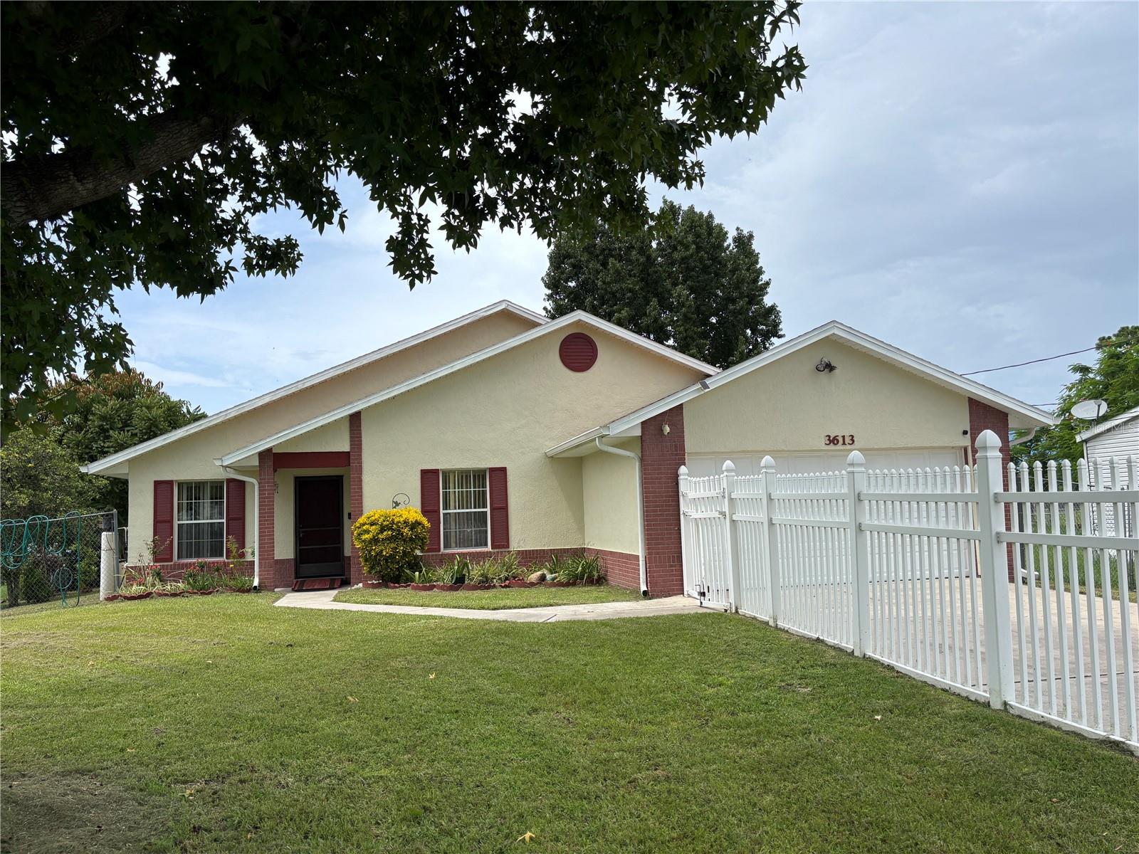 This warm and inviting home seamlessly combines convenient access to medical and tech hubs with the relaxed charm of Florida living. Whether you're embarking on your first move, relocating for work, or seeking a prime location, this family residence in a rapidly growing area truly stands out.
Enjoy the benefit of no homeowners association (HOA) fees. The community is just minutes from Lake Nona’s Medical City, making it ideal for professionals and families alike. Orlando International Airport is a mere 15-minute drive away, and world-renowned theme parks are just 35 minutes from your doorstep. Major highways like 417 and Florida's Turnpike are easily accessible, ensuring smooth commutes.
The home offers three comfortable bedrooms and two bathrooms. The kitchen has granite countertops, and space for dining table. Step outside to your backyard oasis, where mature mango and avocado trees, among others, provide fresh produce ,It is a very tropical ambiance.
Experience the perfect blend of comfort, convenience, and tropical serenity. Schedule a visit today to truly appreciate the beauty and charm of this cozy property.