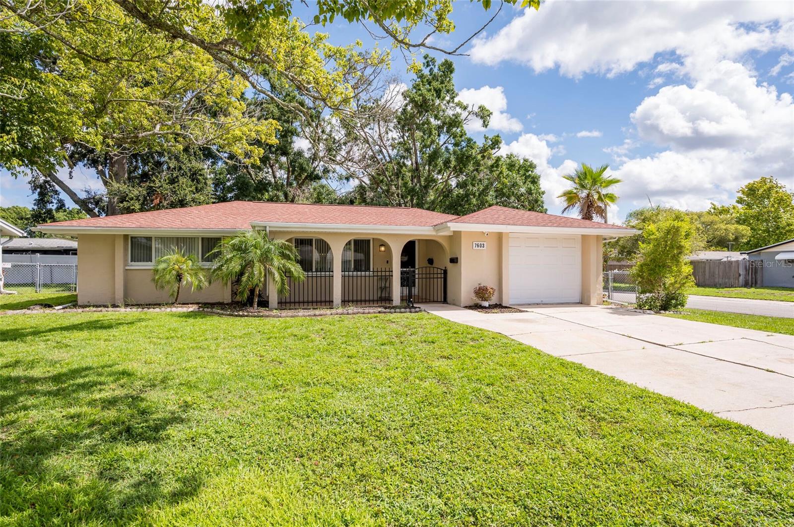 Welcome to a prime location in New Port Richey, one of Pasco's fastest-growing areas! This beautifully updated 3-bedroom, 2-bathroom home features laminate wood flooring, a newer roof, updated bathrooms, energy-efficient windows in the main areas, and sits on a spacious corner lot with a privacy fence and additional dog run. Great kitchen with generous granite counter-space, solid wood cabinets and stainless steel appliances. Conveniently close to Trinity's shops, a short drive to Florida's stunning beaches, and just 35-40 minutes from Tampa International Airport. With newer AC, hot water heater, and roof, plus a 1-year warranty, schedule your showing today and make this home yours tomorrow!