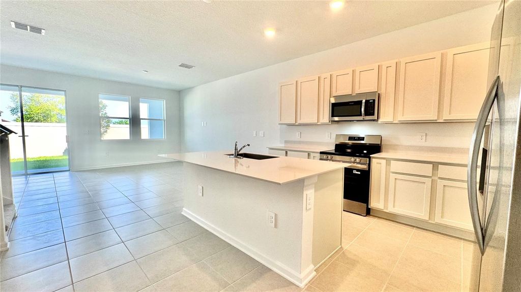 Photo of 319 Sol Vista Drive, Dundee, FL 33838 (MLS # S5146463)