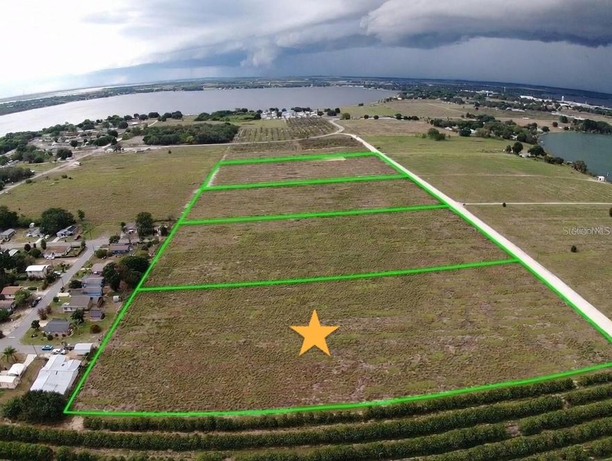 Beautiful 5+ acre vacant land in Frostproof, FL. This property offers potential for your dream home or investment.