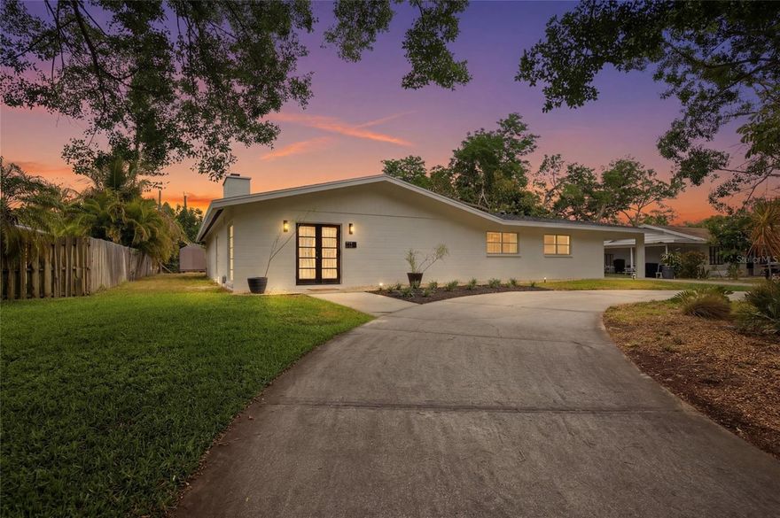 At 615 Fontana Ln, there is an ease to this home that you feel the moment you arrive. Clean lines, wide-open skies, and a welcoming facade set the tone for what waits inside—a beautifully refreshed 3-bedroom, 2-bath residence with 1,648 square feet of light, comfort, and effortless livability.

Inside, the home opens into a bright and airy living space where sunlight moves freely across expansive tile floors and crisp white walls, creating a sense of calm and possibility. The living and dining areas feel both grounded and open, offering the kind of layout that invites quiet mornings, lively dinners, and everything in between. At the heart of the home, the white brick fireplace brings warmth and character, framed by built-ins painted in a rich, moody green that add depth and a thoughtful designer touch.

The kitchen is fresh and timeless, blending clean white surfaces with warm wood cabinetry for a look that feels both modern and welcoming. It is a space designed for everyday ease, where morning coffee, weeknight dinners, and casual conversation all find their place. Throughout the home, the recent refresh is evident in the simplicity, brightness, and move-in ready appeal.

The bedrooms offer a peaceful retreat, including a spacious primary bedroom with sliding glass doors that draw the outdoors in and create a quiet connection to the backyard. Both bathrooms feel fresh, light, and serene, with soft finishes that echo the home’s overall sense of comfort.

And then there is the backyard—generous, private, and full of potential. The expansive covered patio stretches along the rear of the home, creating an inviting space for outdoor dining, long conversations, and laid-back Florida evenings. Beyond it, the large backyard opens wide, ready for gardening, gatherings, pets, play, or simply enjoying the space to breathe.

Move-in ready and full of understated charm, 615 Fontana Ln is a home that feels easy to love—refreshed, inviting, and ready for its next chapter.