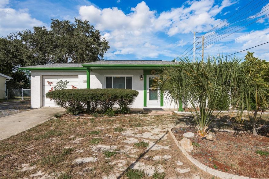 Discover this remarkable home with meticulous care evident throughout its 25-year ownership! This charming 3-bedroom residence, inclusive of an additional room perfect for an office, boasts 2 bathrooms, and a unique garage conversion currently serving as a 3rd bedroom—effortlessly revertible to its original purpose (approximately 132 additional living space not included in 1020 sq ft). Situated on an expansive .23-acre lot, double car driveway and 50 feet of frontage is to the right side of house for your use, relish the luxury of ample parking for your RV or boat without the constraints of an HOA or the necessity for flood insurance.

Embrace the comfort of Double Pane Windows gracing all exterior views, while the master suite offers a spacious retreat accompanied by a generously sized master bathroom. The expansive 20x11 vinyl enclosed porch, seamlessly connected to the kitchen, provides an ideal setting for outdoor enjoyment.

The kitchen, equipped with essential appliances including a refrigerator, range, and dishwasher, features a convenient pass-through to the porch. A fenced yard enhances privacy, and the convenience of a washer and dryer adds to the home's practical appeal. The oversized one-car garage, currently transformed into a 3rd bedroom, incorporates 5 feet of storage space in the front—offering versatility for future use.

Key features include a new main roof installed in 2017 and a permitted room addition in 2003. This residence is strategically located for easy access to shopping, hospitals, and Tampa International Airport, all within approximately 30 minutes. Don't miss out—act swiftly to secure this enticing opportunity!