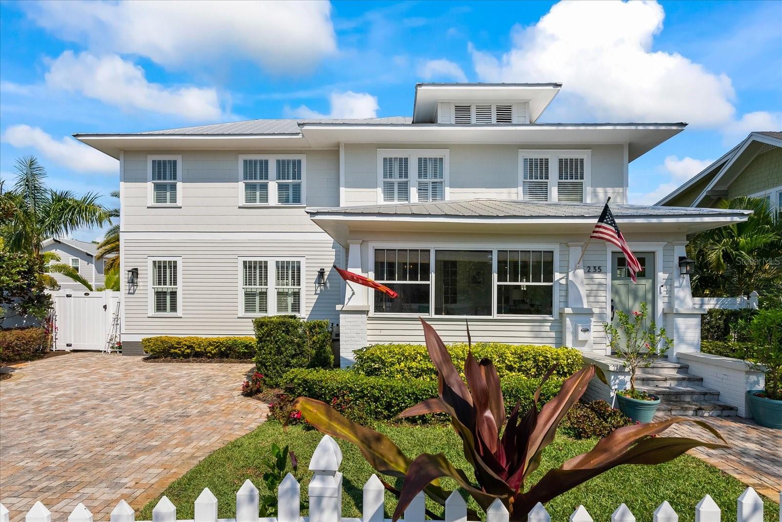 AVAILABLE NOW & SUMMER SPECIAL @ $13,000 monthly. Plan your next SNOWBIRD GETAWAY and discover the ultimate Florida living experience at THE BUNGALOW BY THE BAY, a FULLY FURNISHED MONTHLY RENTAL. This charming 5 bedroom, 5 bath pool home is located in ST PETERSBURG'S historical and walkable OLD HISTORIC NORTHEAST neighborhood. This is your chance to enjoy the sun-soaked summers or plan a winter retreat. Situated just four blocks away from the Tampa Bay waterfront, this home offers a picturesque view from its bright picket fence. Take a leisurely stroll along the brick-lined streets and explore the waterfront park, the iconic Vinoy Resort and Golf Club, the marina, and several parks along Beach Drive. Immerse yourself in the vibrant dining scene, shop at local stores, enjoy live music performances, attend events, visit the St. Pete Pier, appreciate art at The Museum of Fine Arts, and marvel at the stunning Chihuly Collection glass sculptures. Baseball enthusiasts will find Tropicana Field just a short 2-mile drive away. If you're longing for sun, sand, and sea, the legendary Pink Palace, also known as The Don Cesar, awaits you just 10 miles away at St. Pete Beach. Experience the soft sugary sand, sparkling Gulf coast, and breathtaking sunsets that will rejuvenate your soul. This stunning home features five bedrooms, three full bathrooms, two half bathrooms, an inviting front sunroom porch, and a large pool to cool off in the Florida sunshine. Additionally, there's a detached guest home with one bedroom, one and a half bathrooms, a kitchenette, and a living room with a full-size sofa sleeper. The expansive fully fenced yard offers outdoor entertaining spaces, including ample seating areas, a pool, a fire pit, twinkling patio lights, and tropical landscaping that creates a private resort-like ambiance. Inside, an open floor plan seamlessly connects the living room, family room, dining room, and kitchen. The kitchen and family room overlook the pool and backyard, making indoor/outdoor entertaining a breeze. The master suite boasts a spacious walk-in closet and an en suite bathroom. Upstairs, you'll find a laundry room, three additional bedrooms, and a full bathroom. The property provides convenient parking with a front gate and space for 2+ vehicles in the driveway, along with two additional parking spots behind the guest house. If you're looking for a short-term rental close to all the action, look no further than 235 Tenth Avenue NE. Embrace the Florida lifestyle and make this exquisite property yours today. It is available for lease now. Don't hesitate to call and secure your stay. Rental prices vary: $18,000 for peak season (October to April) and $15,000 for the off-season (May to September).