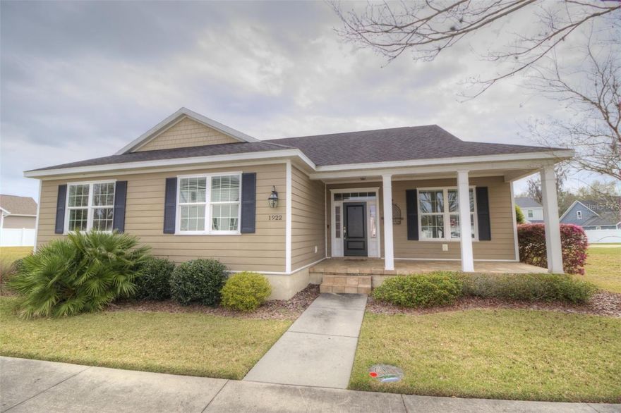 Designed and built by Crestwood Builders. Situated on 1 1/2 lots allowing maximum Curb Appeal and outdoor area functionality. This home is tastefully designed and offers an array of wonderful upgrades such as granite surfaces throughout, 2 large pantries, stainless steel appliances, and beautiful custom cabinetry in the sun-filled eat-in kitchen, split bedroom plan and instant hot water heater, and custom built-ins. New luxury vinyl plank flooring in the living room and formal dining room. The large primary bedroom features a ensuite with walk-in shower, double sinks and private water closet. The laundry room boasts a utility sink and an abundance of storage that is second to none. The backyard is a special place for gathering with friends and family as you sit and relax with that glass of wine or cool beverage. Because of the way this home is situated you are protected from the late day sun. Dedicated 220v automobile charging receptacle in garage. Call to preview this charming home in this quaint front porch community.