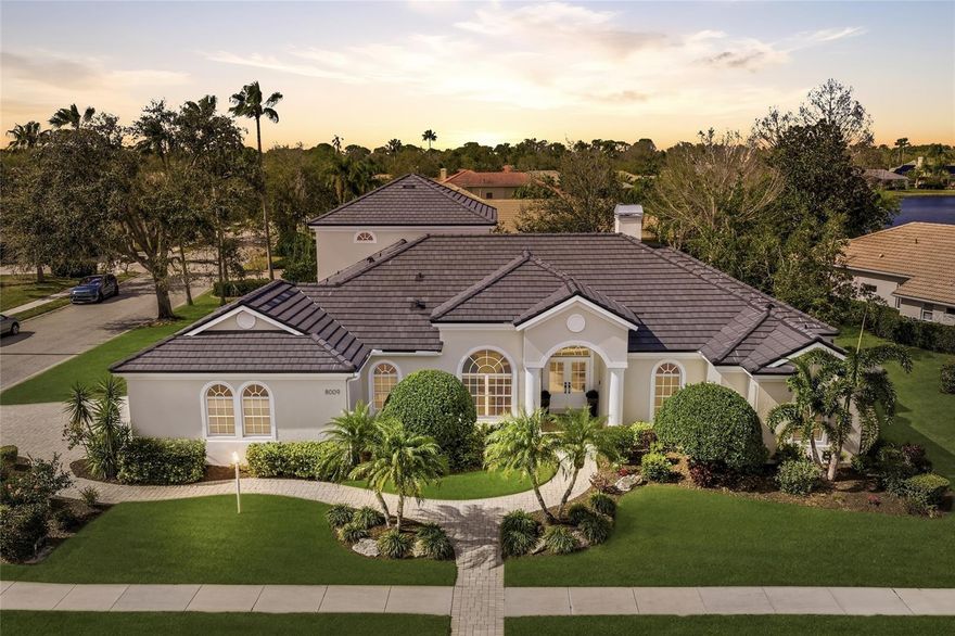 Located in the established Lakewood Ranch Country Club, this beautifully updated residence with a brand new roof offers nearly 4,400 square feet of thoughtfully designed living space ideal for everyday living, entertaining, and hosting family and guests. The main level lives comfortably as a traditional four bedroom home. The privately positioned primary suite features direct access to the pool and lanai, a massive walk in closet, and a beautifully renovated spa style bath with frameless glass shower and garden tub. Two additional bedrooms share a fully renovated Jack and Jill bath, while a fourth bedroom on the main level, currently used as a fitness room, is served by a nearby full guest bath. What truly sets this home apart is the expansive second level guest retreat. Designed almost like a private apartment, this space features two additional bedrooms, a full bath, a den/office, and a separate loft style living area with a wet bar and access to a screened wraparound balcony. Whether used as a private guest suite, in law quarters, teen retreat, home office hub, or space for a live in nanny, the layout offers exceptional flexibility while maintaining privacy from the main living areas. The home has been extensively updated throughout, including a renovated kitchen and baths with quartz counters, new flooring, fresh paint, upgraded lighting, hurricane impact sliding doors, and modern fixtures. Outdoor living is equally impressive with a redesigned pool and spa, an expansive and private lanai, updated outdoor kitchen, and refreshed pool decking creating the perfect setting for relaxing or entertaining. Additional features include a gas fireplace in the living room, whole house water softener, reverse osmosis system, walk in pantry, utility sink in the laundry room, and polyurea coated high performance garage flooring. Set among the mature trees and character of Lakewood Ranch Country Club, with optional club membership available, this home offers a rare combination of space, privacy, and flexibility in one of Lakewood Ranch’s most desirable neighborhoods. Located within minutes of world class shopping, dining, top rated schools, medical facilities, and the Gulf Coast’s renowned beaches.
