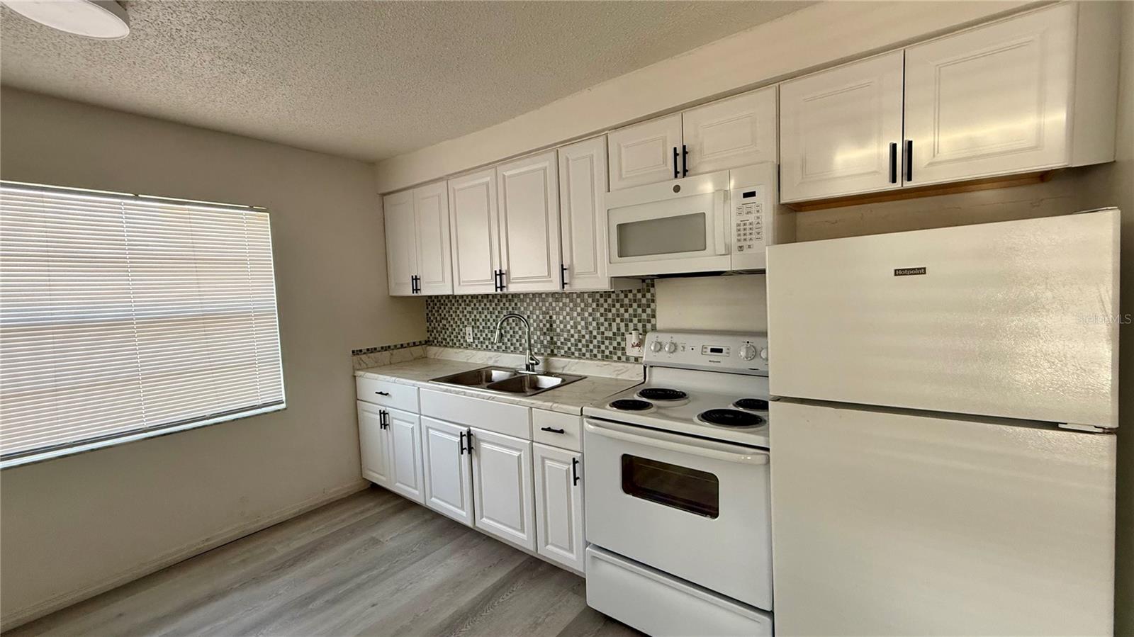 PALM GARDENS CONDO - Residential Lease