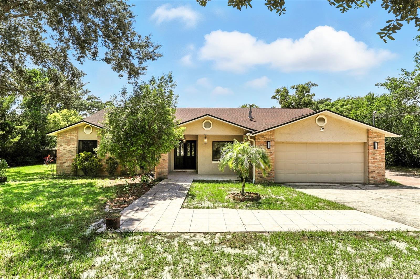 Come view this recently updated, fully furnished 3 bed/2 bath pool home, situated in the quiet McNeils Orange Villa Subdivision. Within minutes of top-rated schools, restaurants, and shopping, with easy access to major highways (SR-434/414 intersection) and the beautiful Lake Lotus Nature Park. Upon entering, you'll be greeted by a spacious living-family room combo with vaulted ceilings and plenty of natural light, leading into the outdoor pool oasis. Tiles throughout the living space, offering views of the pool. Ideal kitchen layout for hosting meals. Master bedroom features walk-in closet and dual-sink en-suite bathroom. Step outside and unwind on the covered patio's terra cotta tiled porch, overlooking the pool and expansive fenced-in backyard. Also included, a laundry room, a large detached workshop and a private electronic front gate. Available now. NO HOA. $95 non-refundable application fee per applicant. Pets OK with $350 deposit ($150 refundable). Qualifications: Income 3X rent, credit score of 700 plus, and background checks. Equal Opportunity Housing.