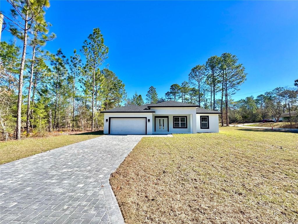 Photo of 7483 N Gims Way, Citrus Springs, FL 34433 (MLS # O6375026)