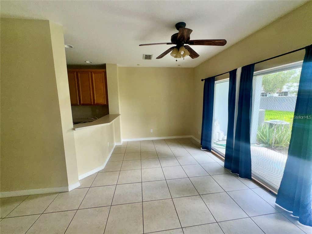 Photo of 9448 Flowering Cottonwood Road #71, Orlando, FL 32832 (MLS # O6432832)