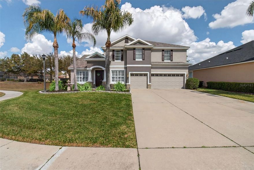 WELCOME HOME! Peaceful, private, and loaded with high-end upgrades, this move-in ready 5-bedroom, 4-bathroom home with a 3-car oversized garage is perfectly positioned on a quiet cul-de-sac in the sought-after Bridgewater community. A new roof, fresh exterior paint, and beautiful curb appeal make a strong first impression.

Step inside to a grand foyer, formal living and dining areas, soaring 10-foot ceilings, and elegant tile flooring that flows into the spacious family room. The fully renovated custom kitchen is a true centerpiece, featuring brand-new high-end cabinetry, stone countertops, a large island, walk-in pantry, and premium appliances — ideal for both everyday living and entertaining. Under the stairs, you’ll find a custom wine cellar and a beautifully designed built-in dog kennel. 

French doors lead to the expanded screened-in lanai, filled with natural light and enhanced with app-controlled trim lighting. The home also features remote-controlled blinds for modern convenience. The lanai includes insulated attic storage with flooring and shelving, plus an additional attic space accessed through the primary closet.

The first floor features one bedroom, a separate full bathroom, and a private office currently set up as a guest bedroom. While not officially counted as a bedroom, it can easily function as a sixth bedroom, offering exceptional flexibility for guests, multigenerational living, or a dedicated work-from-home space.

Upstairs offers exceptional space and versatility, thoughtfully designed for comfortable multigenerational living. You’ll find two spacious primary suites — ideal for a mother-in-law setup — along with two additional bedrooms, one currently used as an office featuring brand-new built-in cabinetry, custom desks and granite countertops. A generous open loft provides the perfect space for movie nights, a secondary living area, or a game room. Three of the bedrooms include custom closet systems, adding both style and elevated organization.

The main primary retreat is very spacious and showcases tray ceilings, custom walk-in closet with built-ins, and a beautifully renovated bath (2021) with dual sinks, garden tub, and walk-in shower. 

Located in the highly desirable Villages at BridgeWater, one of North Lakeland’s most sought-after master-planned communities, this home offers the perfect blend of lifestyle and convenience. Spanning approximately 575 acres, BridgeWater is known for its scenic lakes, abundant green space and welcoming, non-age-restricted atmosphere that appeals to all stages of life.

Ideally situated just minutes from Downtown Lakeland, the community provides easy access to SR 33 and I-4, making commutes to Tampa or Orlando simple and convenient. Shopping, dining, medical facilities, and everyday essentials are all just a short drive away.

Enjoy resort-style amenities at the Lake Club, including a fitness center, community pool with lap lanes, tennis and basketball courts, fishing dock, canoe launch, playground, and open green spaces. With peaceful water views, natural surroundings, and an active community feel, BridgeWater offers a lifestyle that truly stands out.

Schedule your private showing today!