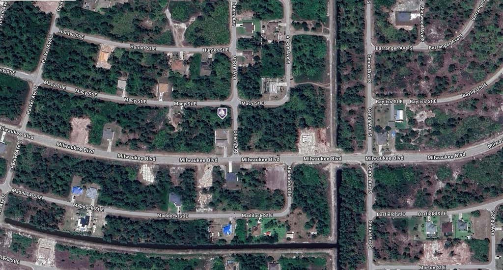 Photo of 1040 Macy Street E, Lehigh Acres, FL 33974 (MLS # A4702753)