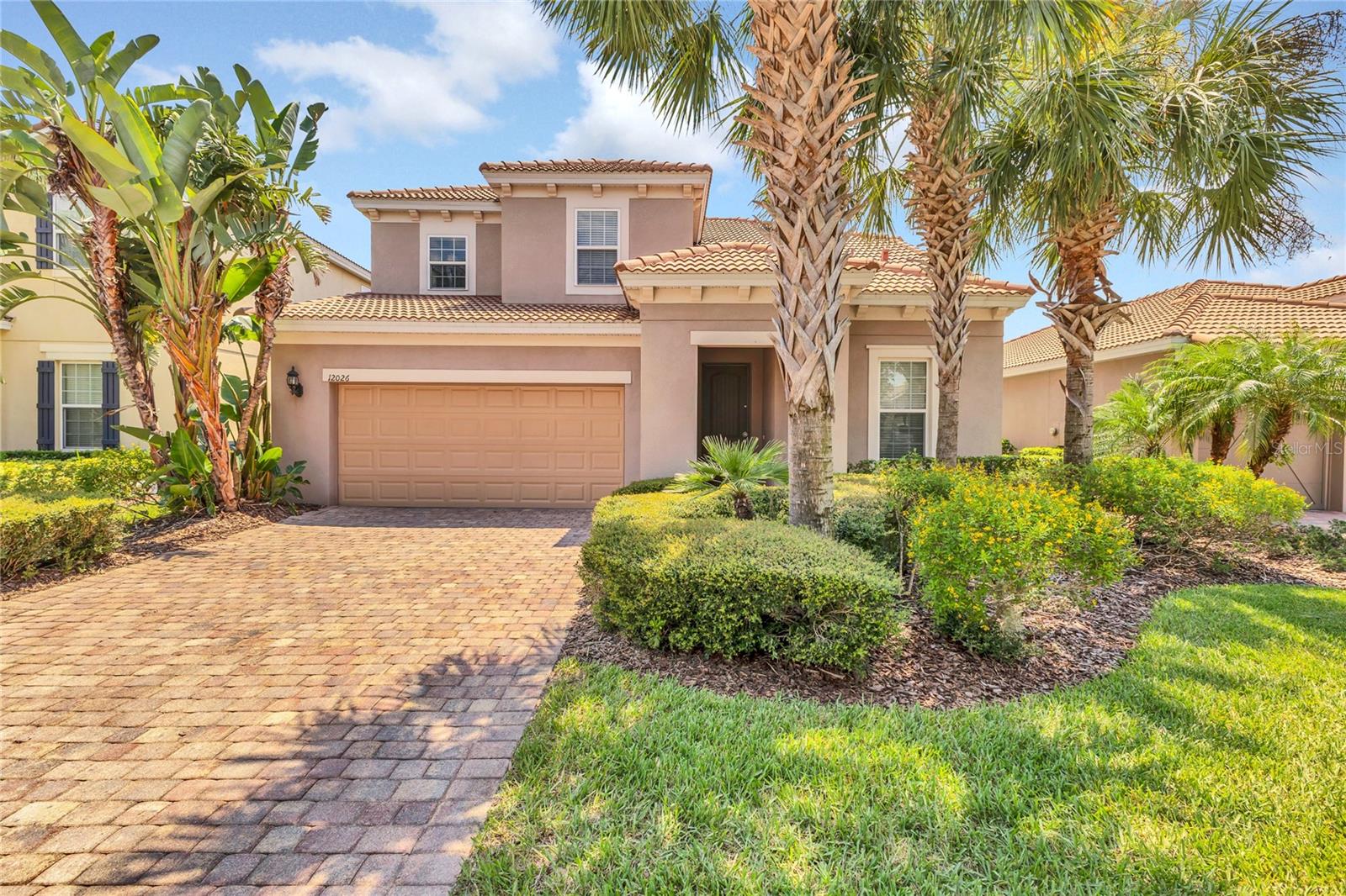 Welcome to this spacious two-story single-family home in the gated, resort-style, maintenance-free community of VillageWalk at Lake Nona. This residence offers 3 bedrooms, an office/flex 4th bedroom, 2.5 bathrooms, a 2-car garage, and approximately 3,015 square feet of living space. Step outside to the covered patio, which overlooks a large backyard and tranquil pond—the perfect spot to relax or enjoy outdoor gatherings.
Upon entry, you'll find a den with French doors to the left—perfect for a home office or guest room. A convenient half bath is located just off the hallway. The kitchen is thoughtfully designed with granite countertops, 42” cabinets, stainless steel appliances, and two spacious islands—all overlooking the open-concept dining and living areas, ideal for entertaining or everyday living. A cozy bonus space next to the kitchen can serve as a study or additional office.
Upstairs, the primary suite enjoys serene pond views and boasts a luxurious bath with a walk-in shower, soaking tub, and dual granite vanities. A versatile loft offers space for a media room or lounge, while two additional bedrooms and a full bathroom complete the second floor.
Residents enjoy an unmatched lifestyle with amenities including a 24-hour guarded gate, two swimming pools (one a heated lap pool), tennis and basketball courts, a fitness center, scenic walking and biking trails, a day spa, gas station, and more. HOA fees cover lawn care, irrigation, basic cable, internet, and full access to community facilities.
Ideally located just minutes from Medical City, Orlando International Airport, the USTA National Campus, top-rated golf courses, major highways, shopping, and dining—this home offers low-maintenance living in one of Lake Nona’s most desirable communities. Don’t miss it!