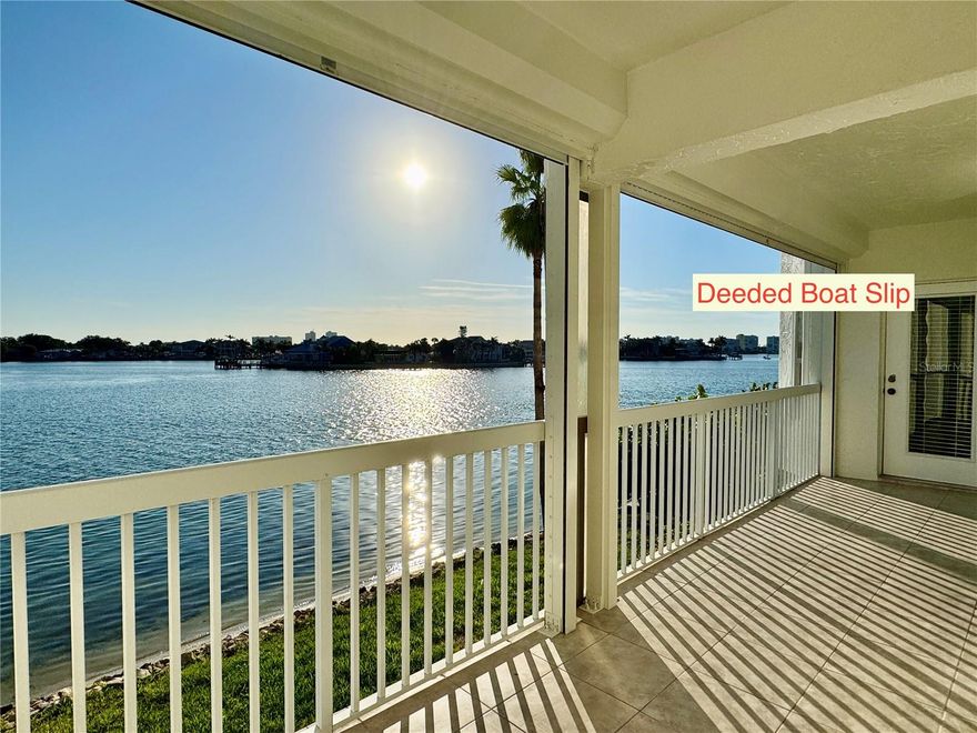 Waterfront condo with boat slip. Enjoy panoramic views of the Intracoastal Waterway from your oversize balcony at Captiva Cay Condominiums. Includes a 32’x15’ deeded boat slip with 12,000 lb lift in the sheltered private marina. This condo features 2 bedrooms, 2 baths, plus a den that could easily serve as a third bedroom. The primary suite has bay windows overlooking the water with a door to the balcony, and a walk-in closet. Captiva Cay amenities include a waterfront clubhouse, well-equipped gym, two heated pools (25-yard lap pool) spa, fishing dock, private beach ideal for kayaking and paddle boarding, and beautiful landscaping throughout. Nearby is Sunset Beach, restaurants, bars, parks, including a dog park, and tennis courts. Includes assigned parking under the building and storage unit. The first floor of this building is approx. 17' above sea level. The milestone inspection has been completed and the association is in compliance with the law’s requirements.