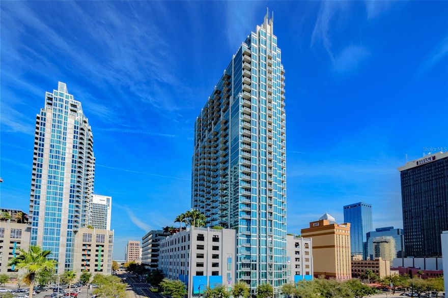 DOWNTOWN TAMPA! LIMITED SUPPLY, at SKYPOINT with the BEST SOUTH FACING VIEWS in the building ! This RARE condo is located on the 12th Floor with Soaring Views of the Tampa Bay, Downtown Skyline, Hillsborough River, Curtis Hixon Park, and Glazers Museum. You will feel suspended in the sky with panoramic views through the floor-to-ceiling glass windows. This one bedroom, one bathroom condo has 772 sf of living space, a huge master bedroom that can easily fit a king bed, updated tile flooring, a MASSIVE walk-in closet with custom storage, a spacious balcony, and one assigned parking space with stainless steel appliances and granite countertops throughout. Building amenities include 24/7 concierge, controlled building access, spectacular pool deck and spa, landscaped terrace, club room with billiards, media room and state-of-the-art fitness room, with restaurants right below at street level in the buildings mixed use spaces. Contact us today to schedule your private showing before it's too late! NO PETS, NO SHORT TERM RENTALS, CORPORATE LEASING, SUBLEASING OR AIR BNB.