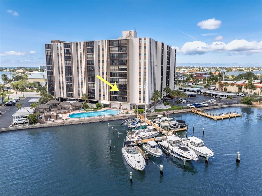 Photo of 10355 Paradise Boulevard #208, Treasure Island, FL 33706 (MLS # TB8553965)