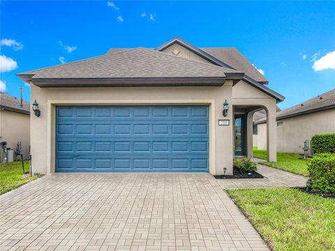 Photo of 210 Tomelloso Way, Davenport, FL 33837 (MLS # O6336002)