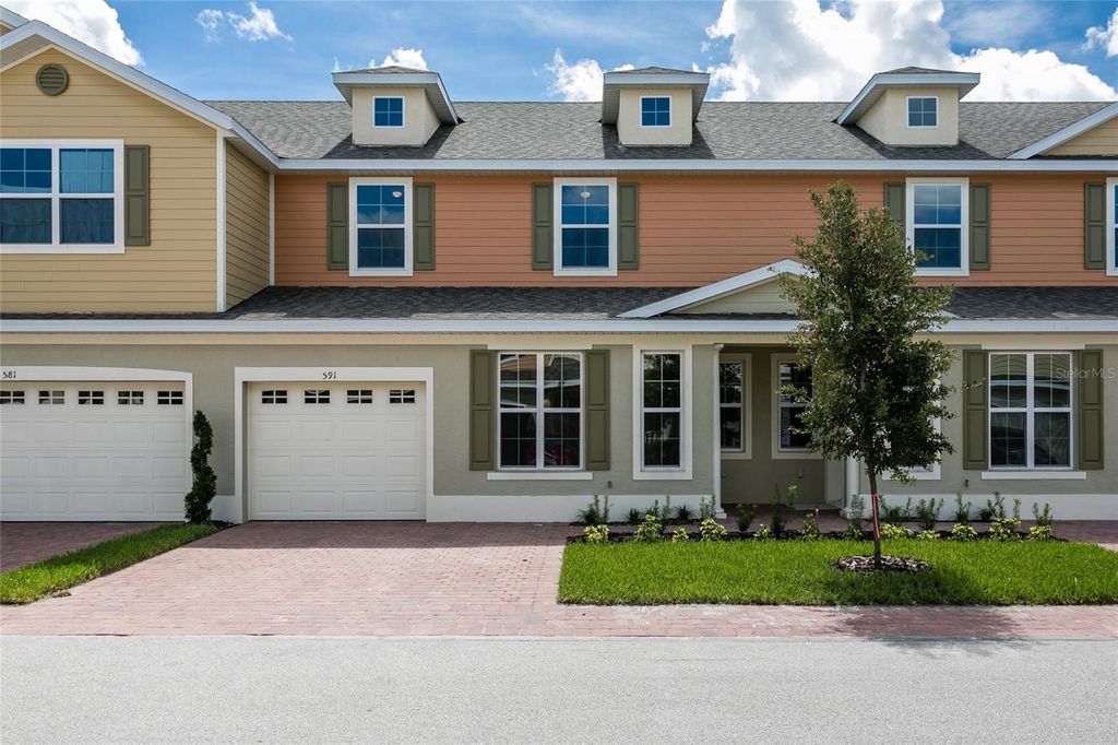 Photo of 591 Pacitto Way, Saint Cloud, FL 34769 (MLS # R4910476)