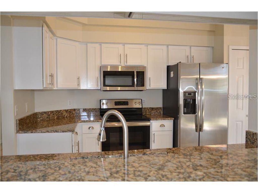 Photo of 10636 Crescendo Loop, Clermont, FL 34711 (MLS # O6404596)