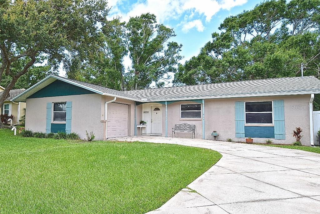 NEW ROOF WILL BE INSTALLED BEFORE CLOSING. A beautiful and cozy 3 bedroom/2 bathroom with newer AquaSeal laminate flooring in living room, bedrooms, and hallway. Newly installed solid core interior doors. Beautiful and bright kitchen with window view to lanai/backyard. Fully fenced backyard for privacy and solitude. This home is located on a short connector street street with very little through traffic, making it safe and quiet neighborhood. Our home has been perfect for us these past 7 years, and hopefully it will be perfect for you too! Don't miss out!