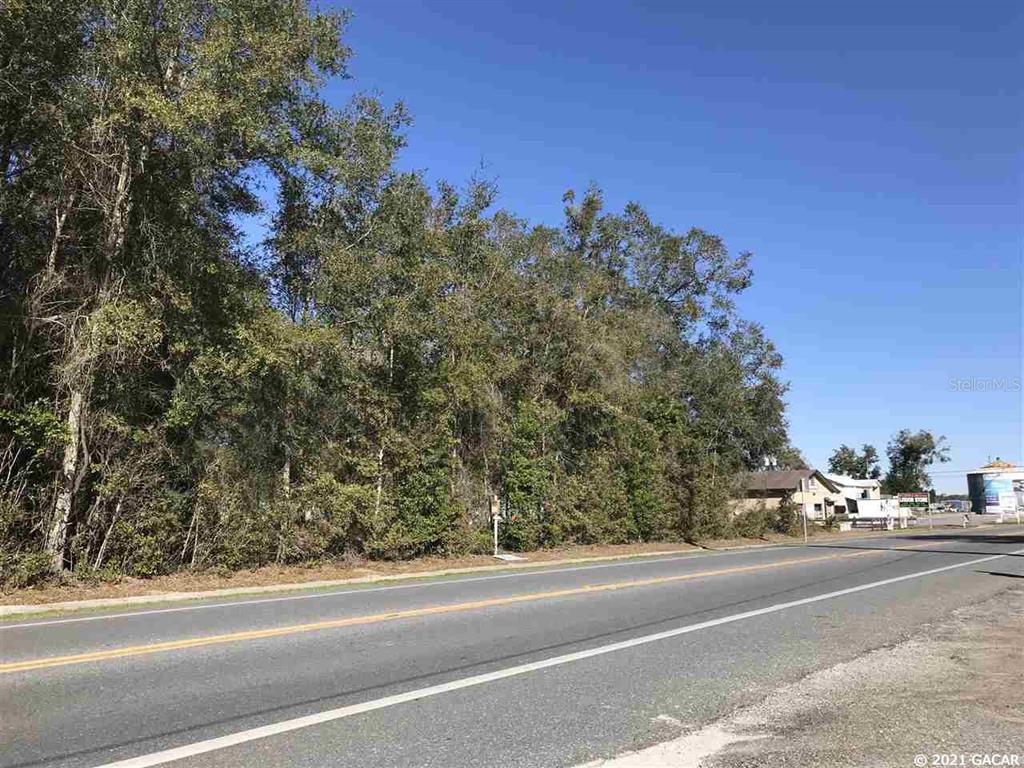GREAT LOCATION COMMERCIAL LOT WITH SR 26 TRAFFIC. ELECTRIC/SEWER/WATER METER AVAILABLE ON THE PROPERTY, READY TO BUILD. A SURVEY IS AVAILABLE. THIS IS THE LAST COMMERCIAL LOT IN TRENTON AREA, DON'T MISS IT.