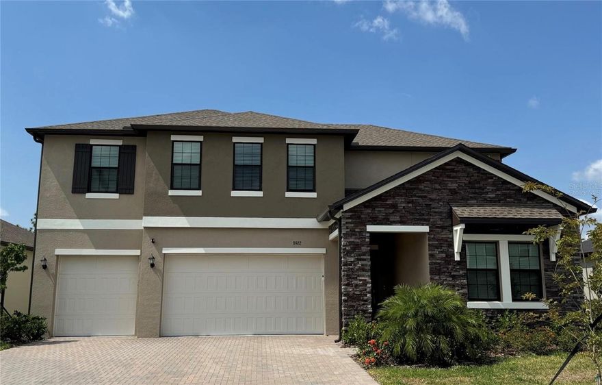 Welcome to your dream home in the serene community of Connerton Village, nestled in the picturesque landscape of Land O Lakes, Florida. This luxurious 2023-built residence offers a harmonious blend of modern elegance and natural beauty, designed to exceed your expectations in every aspect. As you step into this meticulously crafted home, you're greeted by an abundance of natural light dancing off the high-quality tile flooring that graces the main level. The heart of the home boasts a stunning kitchen featuring sleek quartz countertops, providing both style and functionality for your culinary adventures. Indulge in the convenience of a spacious three-car garage, offering ample storage space for your vehicles and recreational gear. Whether you're a car enthusiast or simply need extra room for storage, this garage has you covered. Beyond the impressive interiors, step outside to discover the breathtaking waterfront view that awaits you. Whether enjoying a morning coffee on the patio or hosting a gathering with friends and family, this serene backdrop creates the perfect ambiance for every occasion. Located in the desirable Connerton Village community, residents enjoy a plethora of amenities, including parks, trails, and community events, fostering a vibrant and connected lifestyle. Don't miss this opportunity to make this exquisite home yours and experience luxury living at its finest. Schedule your showing today and prepare to be captivated by everything this remarkable property.