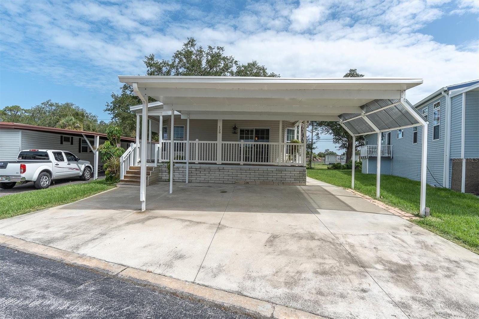 One or more photo(s) has been virtually staged. Welcome to the Active & Highly rated 55+ Resident-Owned Community of Clearwater Cascade where you own a $55,000 land share. Having recently survived both Hurricane Helene and Hurricane Milton without issue, it proves to be a safe choice being built in 2015, allowing you to relax and enjoy your new home. From the moment you walk into this previous park model home you will feel at home with the very spacious layout, high ceilings and natural light. Your 2 bedroom, 2 bath home plus office/3rd bedroom/bonus room has an open concept and is light and bright with inside laundry, an En-suite bath in the primary bedroom with a walk in shower and a walk in closet. The other bedroom is above average size with nice size closet. You can do some great cooking in the kitchen with the size and great layout, the dining room is spacious and right off the kitchen. With a covered front lanai you will be able to live the Florida Lifestyle to the max! The workshop/shed is great for additional space or working on your projects. The back yard is hugh and shaded to enjoy the outside, no rear neighbors and you are located on a canal. Roof is Brand New 2025, AC 2020. This home is move in ready for you to start enjoying the Florida Lifestyle as a seasonal or permanent resident, A great mix of Seasonal and Permanent residences from around the United States and Canada currently reside in the park. Clearwater Cascade is a active 55+ resident-owned community, offering an exceptional lifestyle with a wide array of amenities. Residents can enjoy two heated pools (Adult only and family friendly), indoor sauna men and women separate, Large indoor hot tub, clubhouse, Extensive Library (to include games, puzzles, and videos), fitness room (Active water aerobics and indoor fitness classes), and a variety of activities, including billiards, ping-pong, lighted shuffleboard,, Multi-sport Courts w/league play (Shuffleboard, Bocce Ball, Horseshoe, Golf practice driving area) dances, Active Volunteer Community, Social Club, and Veterans Group, Resident Leagues (golf, bowling, poker, and much more) and more. The community is clean, safe, and well-maintained for all park residents (includes night safety patrol). Yes we are Pet friendly (small pets only, approval from park required). Ideally located near Publix, Walmart Grocery, and Winn Dixie located within 3 miles and a Florida favorite Three Public Golf courses within 10 miles. A Community Guide is published monthly (resident/board editorials, updates regarding park, and numerous community resources) Your home comes with a $55,000 land share included and low monthly association fees of just $352 covering cable, internet, water, sewer, trash, lawn care and all community amenities. Schedule your showing today!