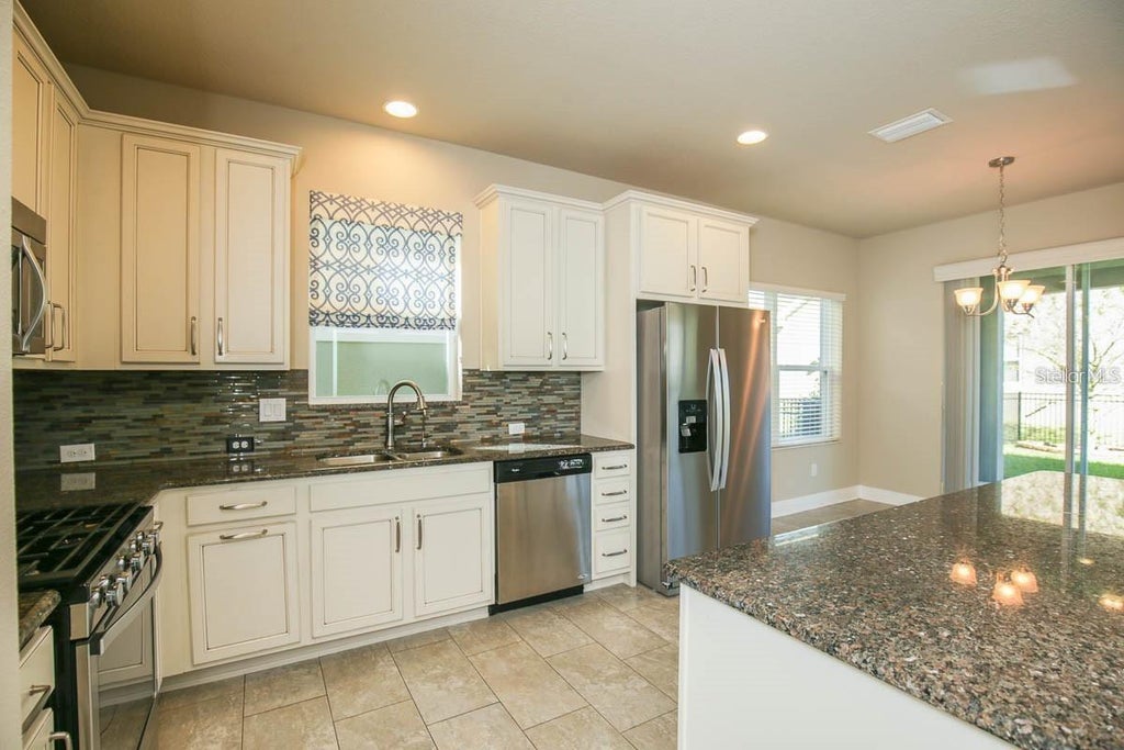 Photo of 14304 Parkside Ridge Way, Lithia, FL 33547 (MLS # L4964983)