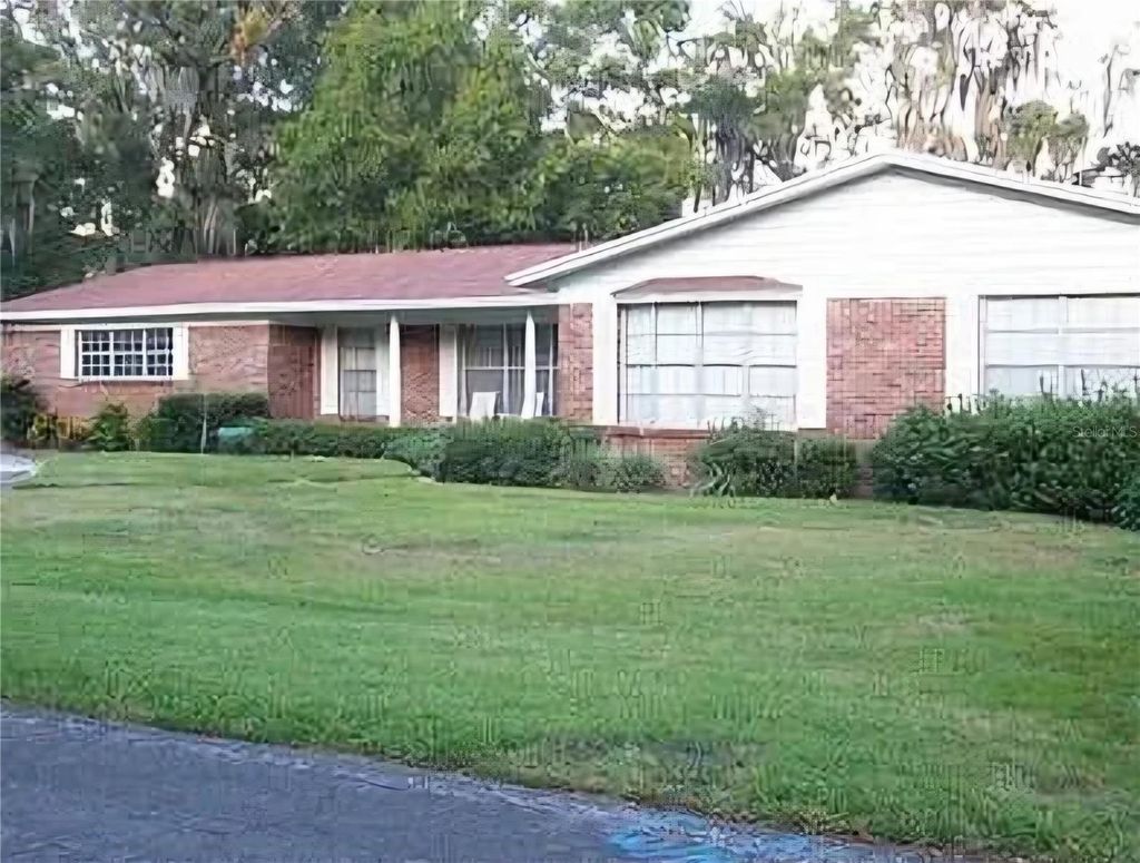 Photo of 712 W Russell Drive, Plant City, FL 33563 (MLS # TB8473934)