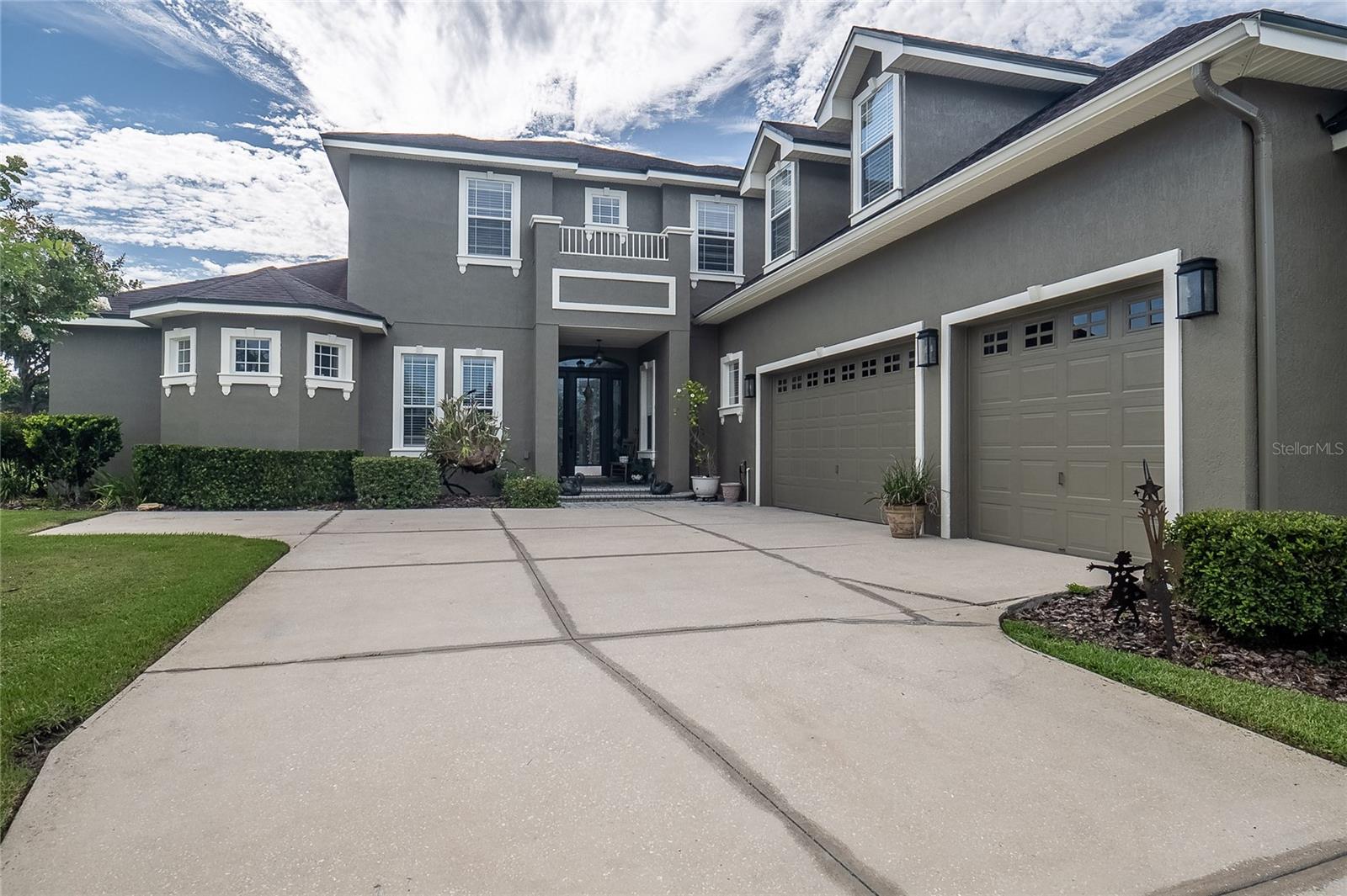 Welcome to your dream home, located on the 9th hole in the highly sought after Eaglebrooke Golf Course Community! NEW ROOF 2025, NEW HOT WATER HEATER 2024 and EXTERIOR FULLY PAINTED 2025! This stunning 4 bedroom 3.5 bathroom residence combines timeless elegance with comfort. Step inside to find a spacious open-concept layout flooded with natural light, ideal for both entertaining and everyday living. At the heart of the home is a chef-inspired gourmet kitchen featuring custom wood cabinetry, huge pantry, granite countertops with plenty of storage. The luxurious primary suite is located on the first floor and includes a two person shower with a jetted tub for two with his and her closets. An additional bedroom on the first floor can serve as an office or nursery. Elegant touches are everywhere such as vaulted ceilings, accented lighting, crown molding and 42" stairwell to enhance spaciousness. Step out onto a beautifully appointed lanai - perfect for morning coffee or an evening cocktailwhile taking in the serene view. Whether you're entertaining or unwinding, the seamless flow creates a true resort-style experience at home. The second floor features a spacious room with pool table, wet bar, and full size refrigerator. The upgraded trusses ensure durability and noise reduction in the game room. The balcony offers an elevated view of the golf course. Two generously sized bedrooms and a full bathroom with a large walk in attic are perfectly situated on the second floor. The three car garage offers plenty of room for vehicles, storage and comes equipped with a dedicated EV charging outlet. Enjoy the best of community living with access to a sparkling pool, clubhouse, and an on-site restaurant, perfect for social gatherings or relaxing weekends, and convenient dining just steps from home. Call today to schedule a private showing of this stunning golf course home!