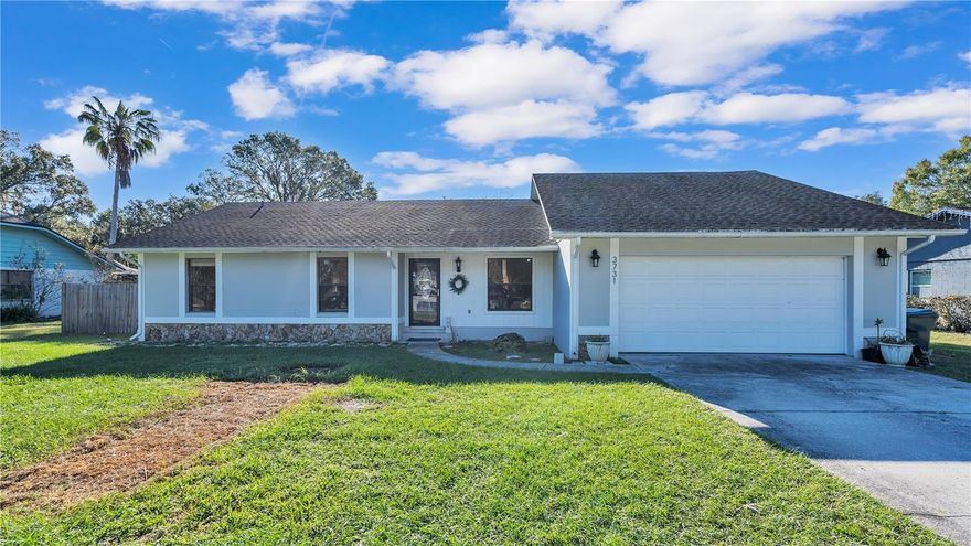 Take a look at this beautiful 3 bedroom 2 bath home with a bonus room. This property has a brand new kitchen, and beautiful wood laminate flooring throughout most of the home. The property has a spacious floor plan with a large living room with a fireplace, formal dining room, and the spacious bonus room. The property has a fully fenced in backyard and a great size lanai to enjoy the cool weather this time of year. Located in Imperial Lakes, this home could be the one for you.