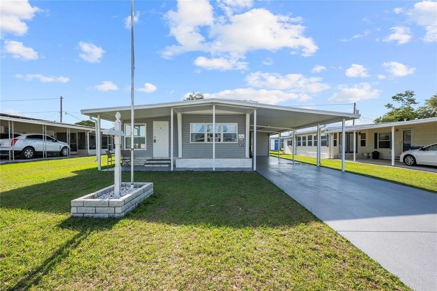 Welcome to Betmar Acres, a vibrant 55+ golf community where you own your land—with a low annual fee of just $448! Whether you're looking for the perfect winter retreat or a full-time home in sunny Florida, this beautifully furnished 2-bedroom, 1-bath residence is truly move-in ready.

From the moment you arrive, you'll notice the exceptional curb appeal and the care this home has received over the years. Recent updates provide peace of mind, including a new A/C (2024), vapor barrier (2024), septic system (2024), freshly painted driveway (2020), and double-pane windows for added efficiency and comfort.

The spacious double carport offers plenty of parking and leads conveniently to a dedicated laundry room and a golf cart shed equipped with an automatic door opener—perfect for enjoying the community’s amenities.

Step inside to a bright and airy Florida room filled with natural light from an abundance of beautiful windows—an ideal space to relax or entertain. The updated kitchen comes fully equipped with dishes and small appliances, making your move seamless and stress-free.

This home truly reflects pride of ownership and is ready for you to start enjoying the Florida lifestyle right away!
Amenities at Betmar Acres: Walking trails over scenic bridges and ponds 2 swimming pools & 2 hot tubs Tennis,
pickleball & basketball courts Bocce ball & shuffleboard 27 holes of golf Mini golf & billiards Game rooms & library Multiple clubhouses Planned
activities, Bingo & fun social events This lovely home offers comfort, convenience, and an active lifestyle all in one wonderful community. Come see it for yourself and discover everything in Betmar Acres!