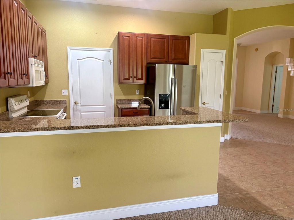 Photo of 9916 Cleghorn Drive, San Antonio, FL 33576 (MLS # TB8486812)