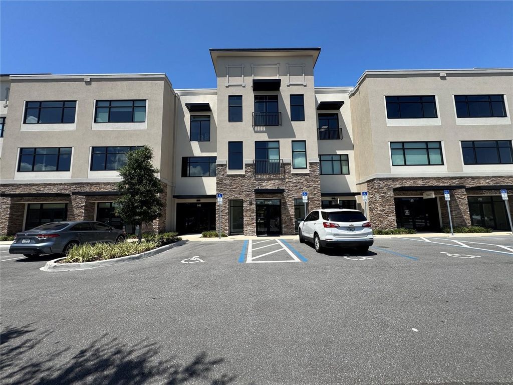 Photo of 13564 Village Park Drive #310, Orlando, FL 32837 (MLS # O6374737)