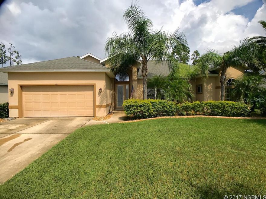 Offered is this Prestigious Breakaway Trails, Ormond Beach 24-hour gate guarded home with on-site amenities. This large one story with a screened in solar heated pool with spa home is nestled on a manicured lot highlighted with matured palm trees, curbing and fenced in backyard for privacy. This is indeed a quality ICI-built home that offers numerous upgrades and amenities which add safety, peace-of-mind, and comfort. The formal living and dining rooms boast wood floors for that touch of elegance. The large tiled open kitchen and family room with hardwood flooring and fireplace. The family room tall sliders expand to your patio and pool deck oasis.  This modern kitchen offers white cabinets, stainless steel appliances, granite counter tops and a walk-in pantry. This a true must see. A real 3D virtual tour is available upon request. All information is intended to be accurate but is no guaranteed ;Water: City