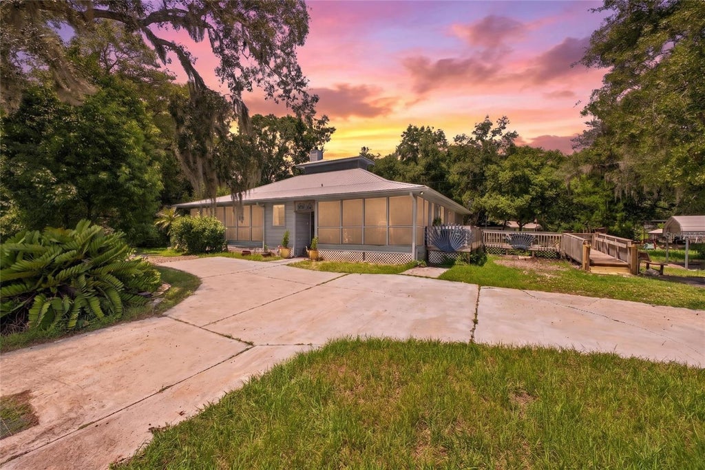 Photo of 25717 Troon Avenue, Sorrento, FL 32776 (MLS # O6437797)