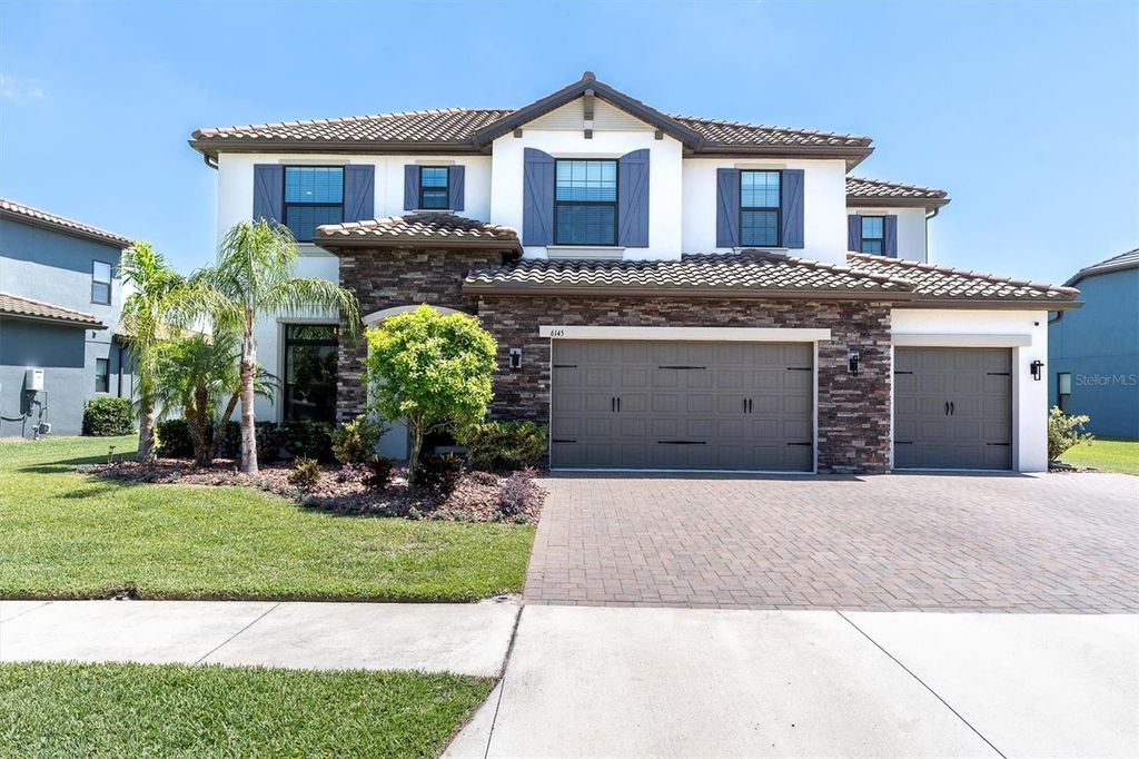 Photo of 6145 Marsh Trail Drive, Odessa, FL 33556 (MLS # W7871665)