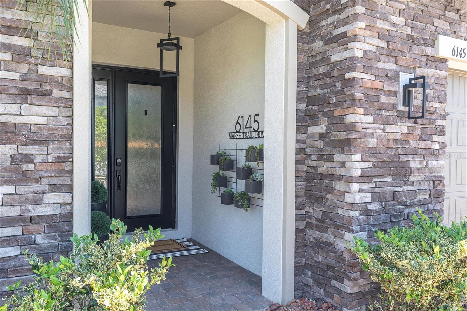 6145 MARSH TRAIL DRIVE