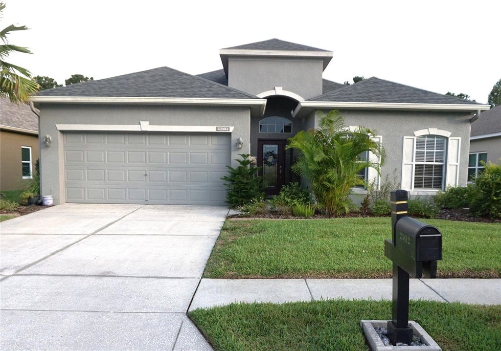 Photo of 23812 Plantation Palms Boulevard, Land O Lakes, FL 34639 (MLS # TB8420653)