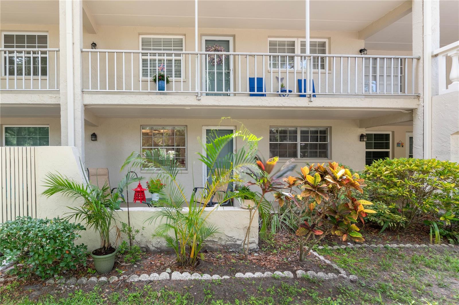 Welcome to the serene 55+community of Heather Lake in the heart of Delightful Dunedin! With a waterview! This furnished ground floor condo offers a dramatic view of the tranquil pond, great for relaxing with your morning coffee. Front and back patios are perfect spots for a gardening hobbyist, and patio furniture can stay. The front door is just steps from your covered parking spot, as well as the laundry room and mail station. No stairs and it's so convenient! Condo has a spacious layout with an enclosed porch that leads to the back patio. Heather Lake has great amenities including an active clubhouse, heated pool, shuffleboard and scenic walking paths—ideal for staying active and social. And within walking distance to public tennis/pickleball courts, and community garden just down the street at Eagle Scout Park. Condo has completed Milestone Inspection, has new roof and exterior paint. Downtown Dunedin is just minutes away, with loads of boutique shops and dining options. Take a stroll or bike ride along the Pinellas Trail, or visit the nearby golf courses and beaches like the beautiful Honeymoon Island State Park. Mease Dunedin Hospital and shopping mall are conveniently located nearby as well. Schedule your viewing today!
