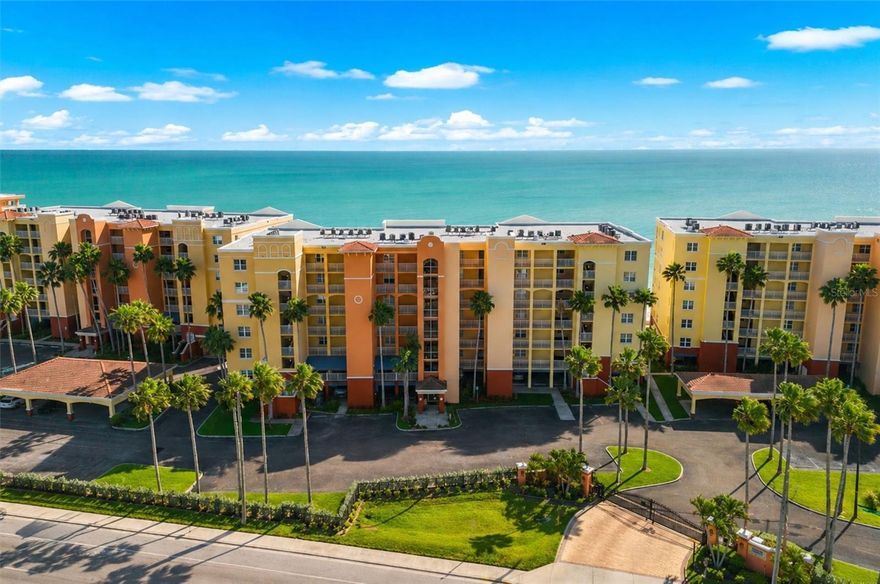 Experience the pinnacle of Gulf-front living at The Tides Beach Club, where refined coastal luxury meets resort-style convenience. This meticulously maintained third-floor residence offers sweeping, unobstructed views of the Gulf of Mexico from one of North Redington Beach’s most sought-after gated communities.

Designed for both comfort and sophistication, the home features an open-concept layout with a desirable split-bedroom floor plan that enhances privacy. Expansive windows fill the space with natural light and frame the water views, creating a seamless connection between indoor living and the shoreline beyond. The kitchen is appointed with solid wood cabinetry, built-in appliances, and generous counter space, ideal for both everyday living and entertaining.

The primary suite serves as a private retreat with a spacious walk-in closet and direct access to the balcony, where morning sunrises and evening sunsets over the Gulf define daily life. The secondary bedroom is well-proportioned and ideal for guests or flexible use.

Residents enjoy world-class amenities including three heated beachfront pools, multiple spas, a fully equipped fitness center, clubhouse, and direct private beach access. The community spans 10 acres of Gulf-front property and is fully gated for privacy and security.

Additional features include assigned under-building parking, private storage, in-unit laundry, and HOA coverage of cable, internet, water, sewer, trash, security, and exterior maintenance. With a one-month minimum rental policy, this residence offers both flexibility and long-term value. This is Gulf-front living at its finest.