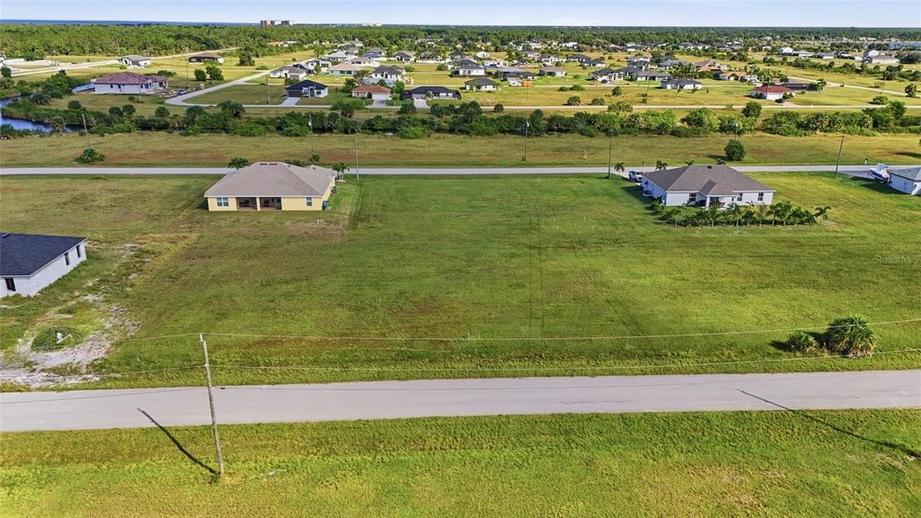 Photo of 3915 NW 38th Lane, Cape Coral, FL 33993 (MLS # OM710295)