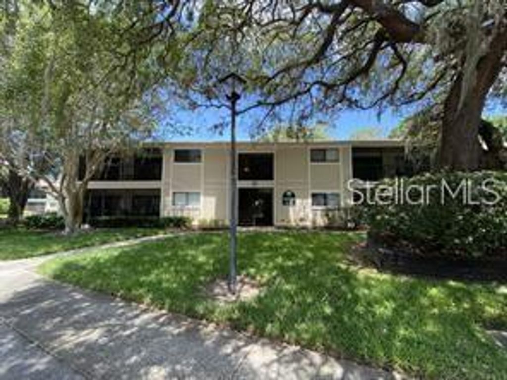Photo of 6004 Laketree Lane #D, Temple Terrace, FL 33617 (MLS # TB8419608)