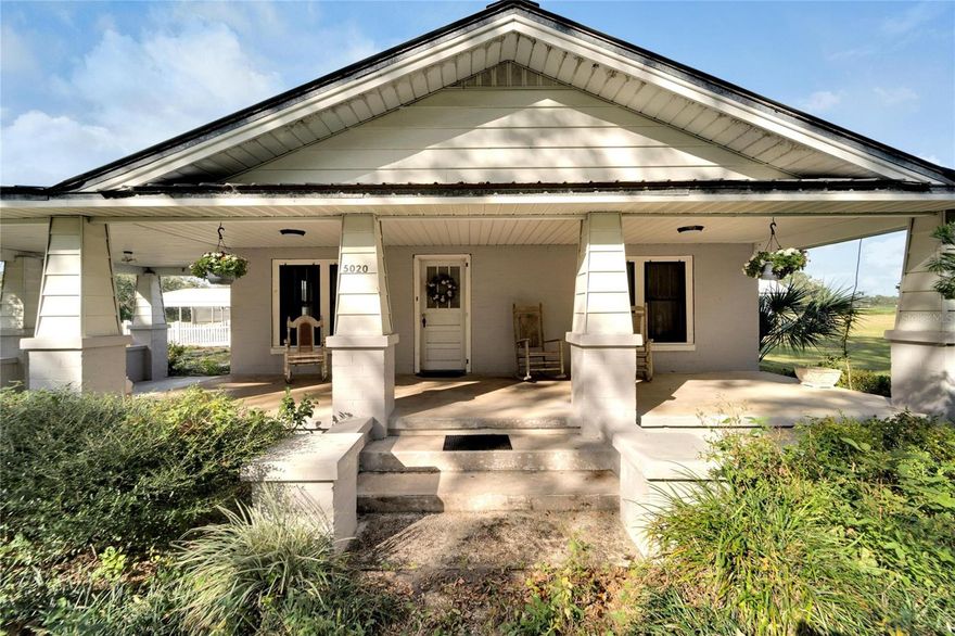 Nestled in the heart of Plant City, a pair of lots at 5020 and 5030 Sydney Road are ready to be yours,(See MLS TB8322808) offering a sprawling 18.79 acres of pure potential! Imagine the possibilities of this serene and versatile property, which not only boasts a charming single-family home and a cozy mobile home, but also a delightful array of pole barns and outbuildings. This tranquil haven is perfect for those seeking a farm, a family compound, or a fresh canvas for a new development venture. There is also an agricultural well on the property.
The main residence is a delightful 3-bedroom, 2-bathroom abode, with an estimated 2000 square feet of living space. The home has been  updated with a newer metal roof, modernized bathrooms, and appliances, all wrapped in a warm embrace of rural charm. The spacious home is a testament to the quiet comfort of countryside living, right den to the covered porch for your rocker. Do not go to property without an appointment.
Accompanying this dwelling is a 1983 Palm Harbor doublewide mobile home, featuring 2 bedrooms and 2 baths within its 1099 square feet. This additional living space provides ample room for guests or extended family, or hired help ensuring that everyone feels welcome and at home on this expansive property. Lots are being sold together. 
The agricultural spirit of the land is reflected in the pole barns, sheds, and out buildings which stand ready to accommodate your RV, boat, and livestock. The existing agricultural well is a nod to the property's fruitful past, which has been farmed with oranges and various crops. The land is zoned for agricultural use, granting you the opportunity to continue the tradition of cultivating. 
Ancient Oaks with mature pecan, mango, guava, cherry, and banana trees, which not only give delicious home-grown produce but also add a picturesque quality to the landscape. 
Currently, the land is under an agricultural exemption, which translates to incredibly low property taxes for the new owners. This is a rare opportunity to own a piece of Plant City's rich heritage while also investing in a property that can be tailored to suit your individual needs and dreams. Whether you wish to preserve its natural charm, develop it into a thriving farmstead, or transform it into a new development, this is your opportunity. This is an Estate sale, Sold AS IS.
As you explore the rolling fields and shaded groves, you'll feel the legacy of the land, a legacy that is now being passed onto you. This is more than just a property; it's a piece of the American Dream, waiting for you to write the next chapter. Don't miss out on this exceptional opportunity to make your mark in Plant City!
