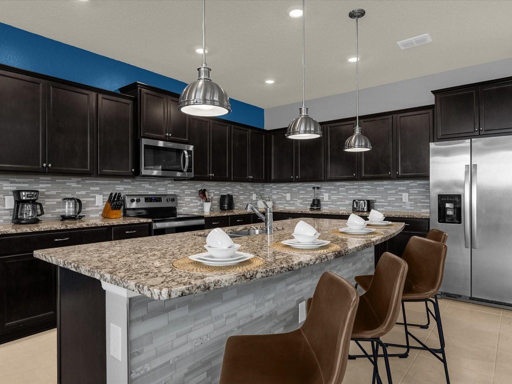 Photo of 3739 Lana Ave, Davenport, FL 33897 (MLS # O6451948)