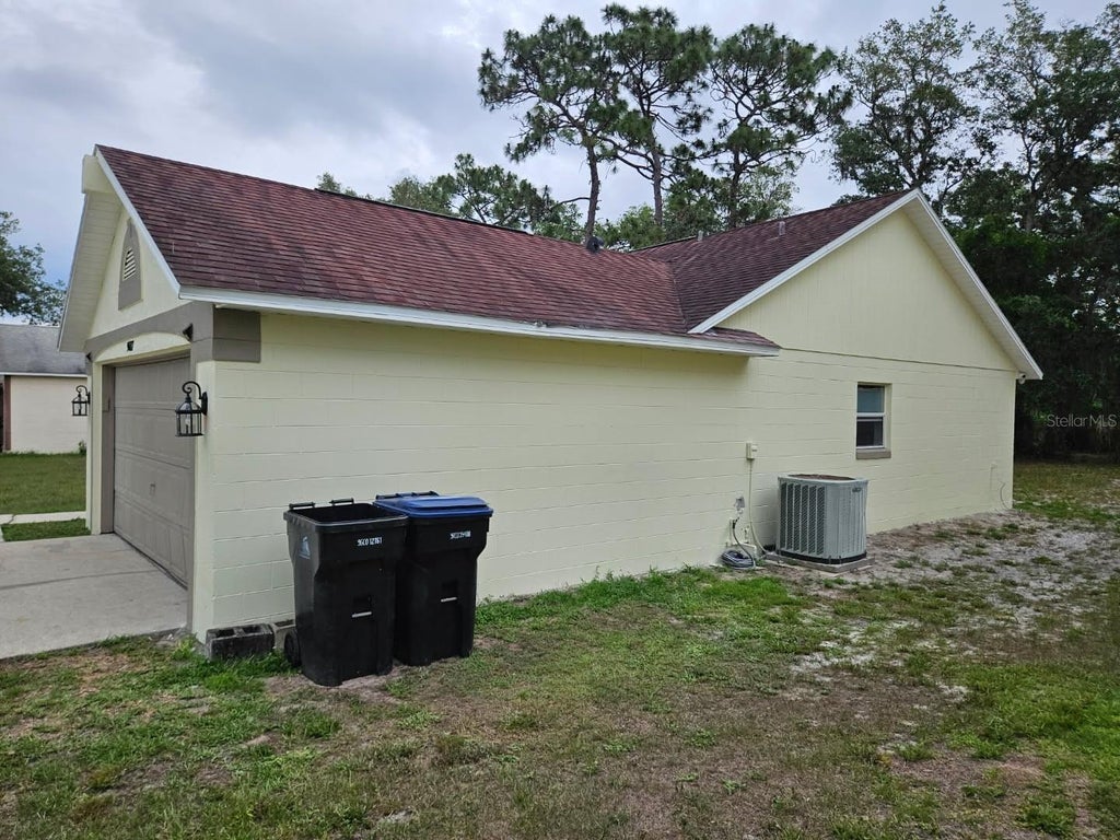Photo of 9687 Lingwood Trail, Orlando, FL 32817 (MLS # TB8519874)